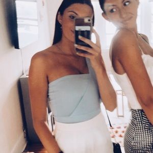 Light blue one shoulder body suit